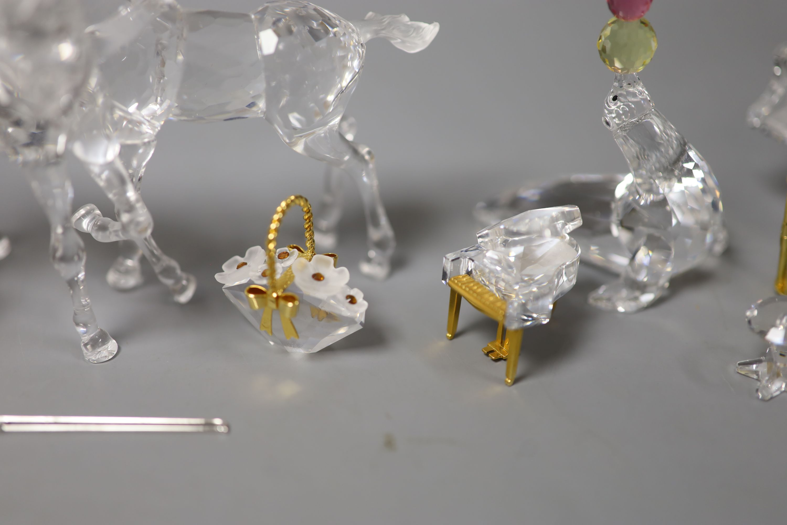 Thirteen Swarovski crystals including Pair of Horses and Seated Clown